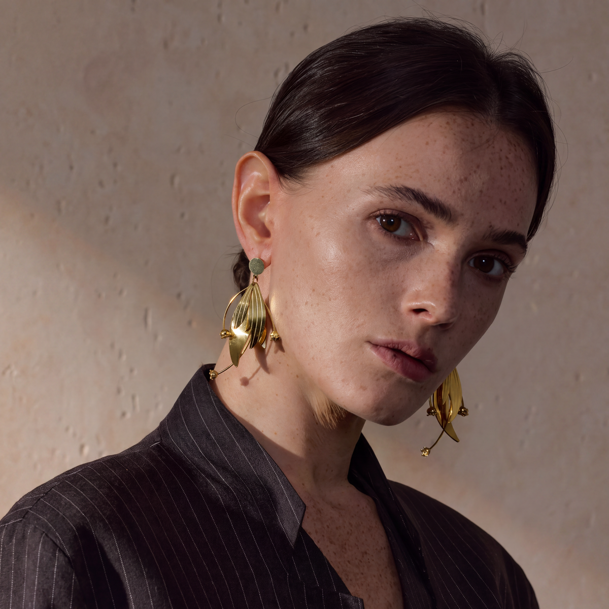 Annie Petal Drop Earrings worn, three-quarter view
