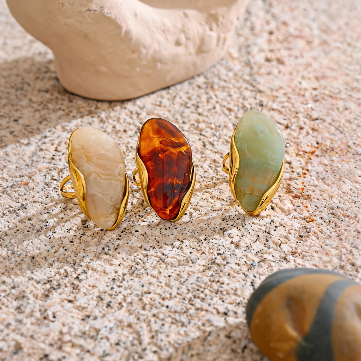 Callie Geometric Resin Ring trio on warm stone