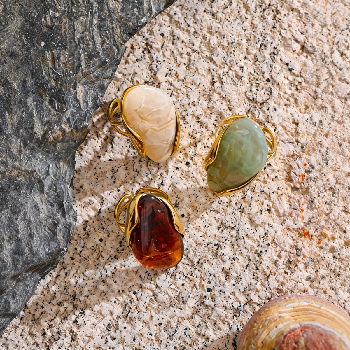 Callie Geometric Resin Ring flat-lay on granite