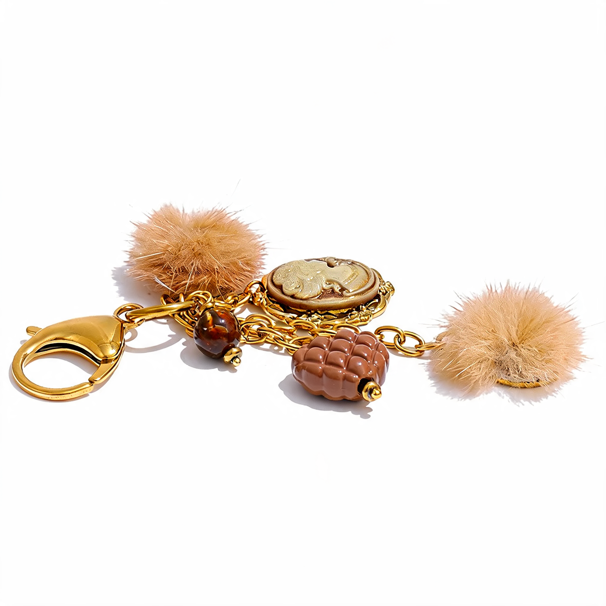Posy Heart Portrait Keychain in Camel - gold-plated charm keychain with resin cameo, quilted heart and faux fur poms - clasp profile and charm detail