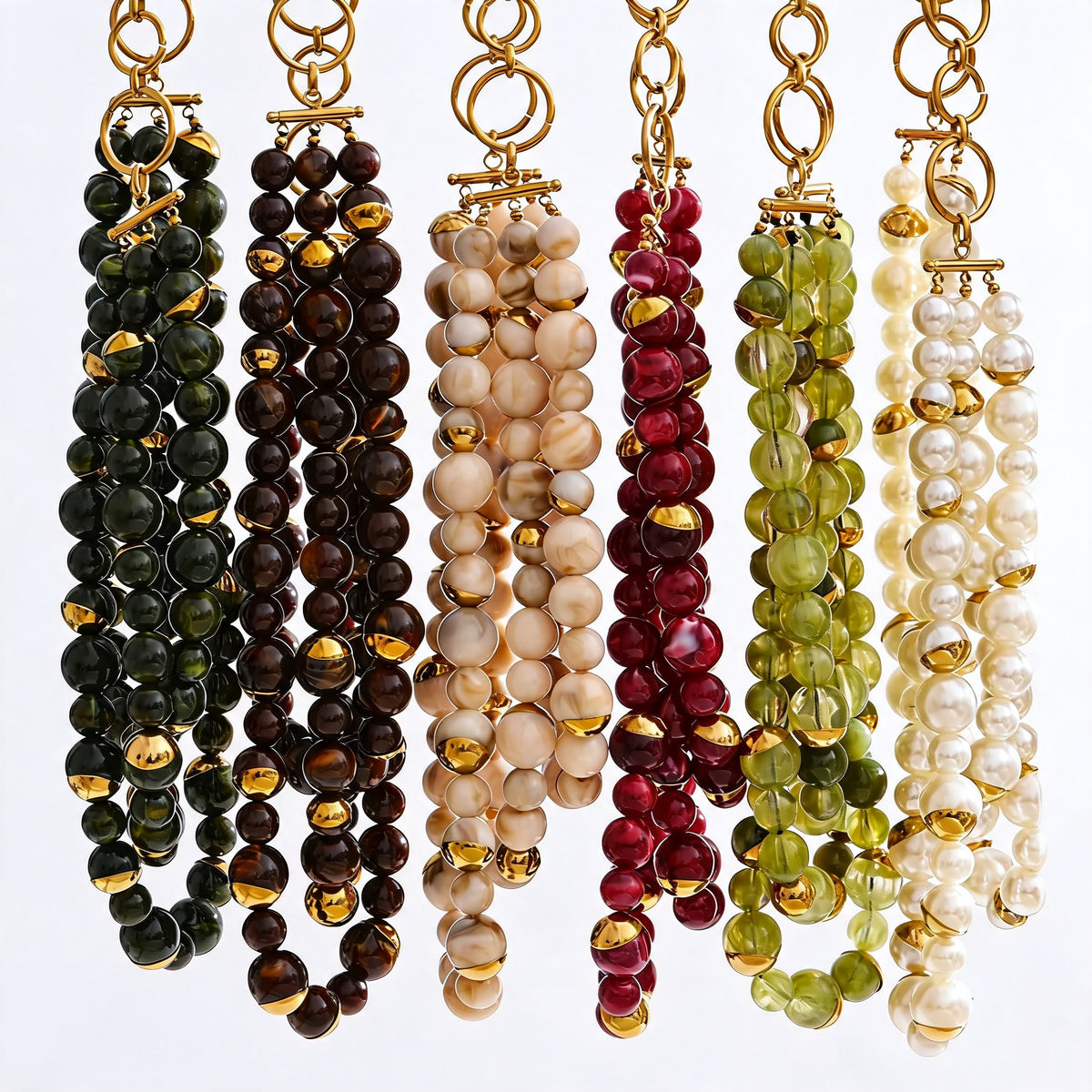 All six bead colorways of the layered necklace shown side by side