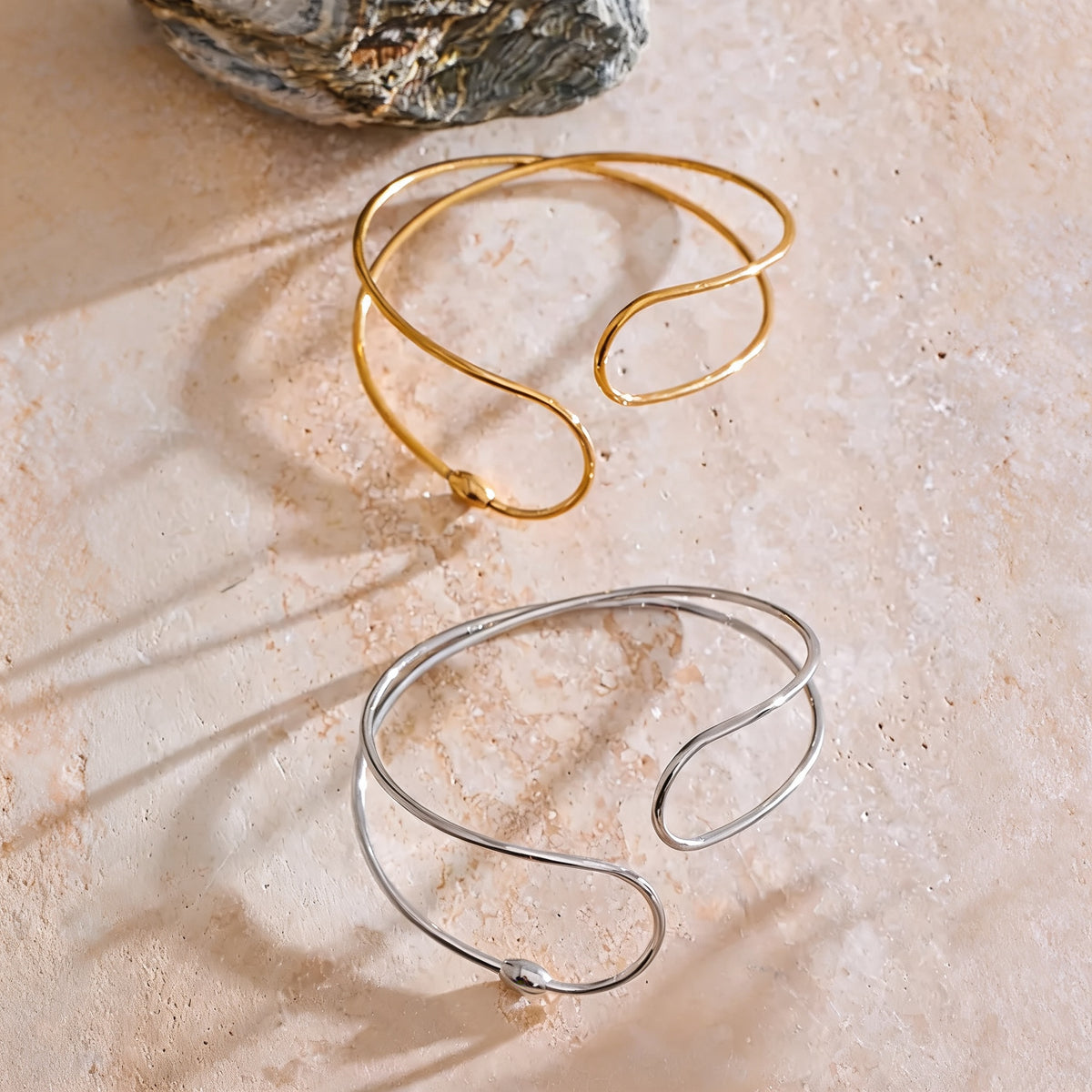 June Hollow Bangle in gold and silver together
