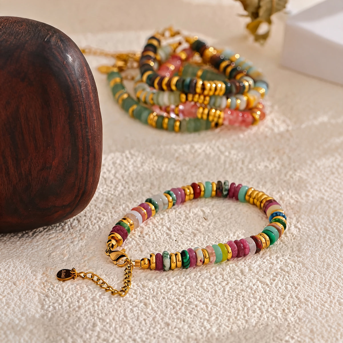 Sedona Stone Bead Bangle in the foreground with a stack of colorways behind